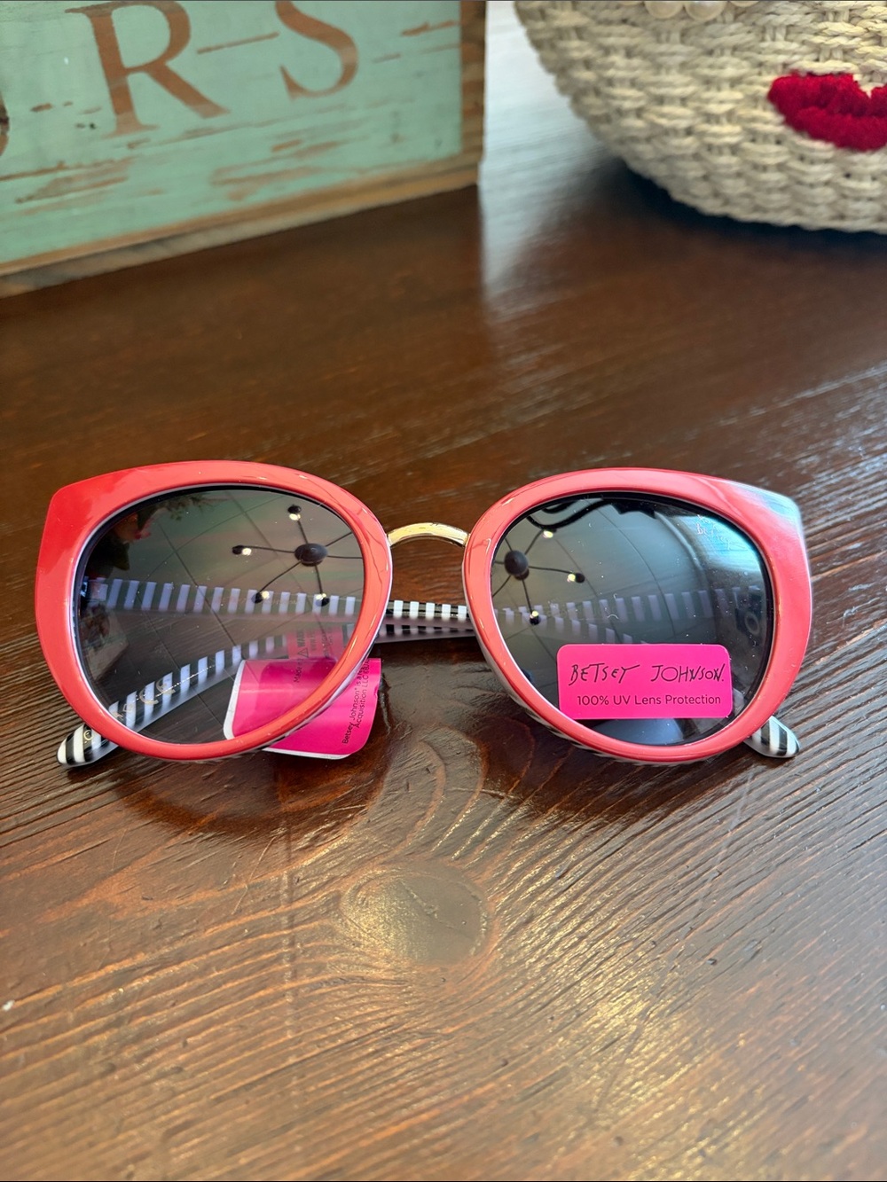 Betsey Johnson Coral Pink Cat-Eye Sunglasses with Striped Temples